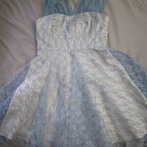 retro-esq blue lace over cream fabric dress from London based company